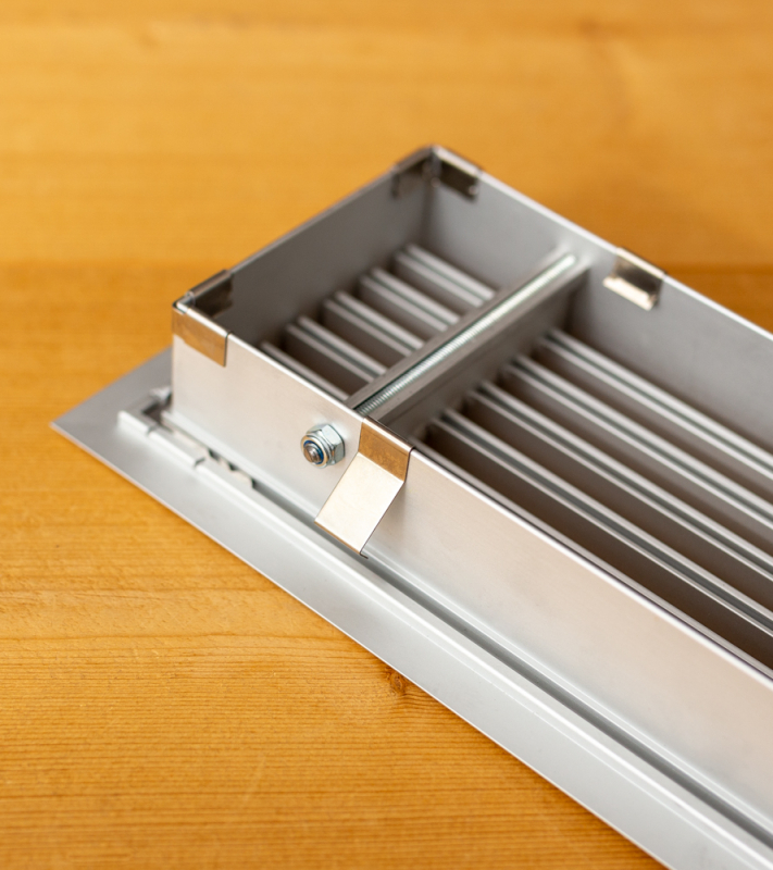 Aluminium wandrooster 1000x150mm met vaste lamellen en klemveren - Klemveren