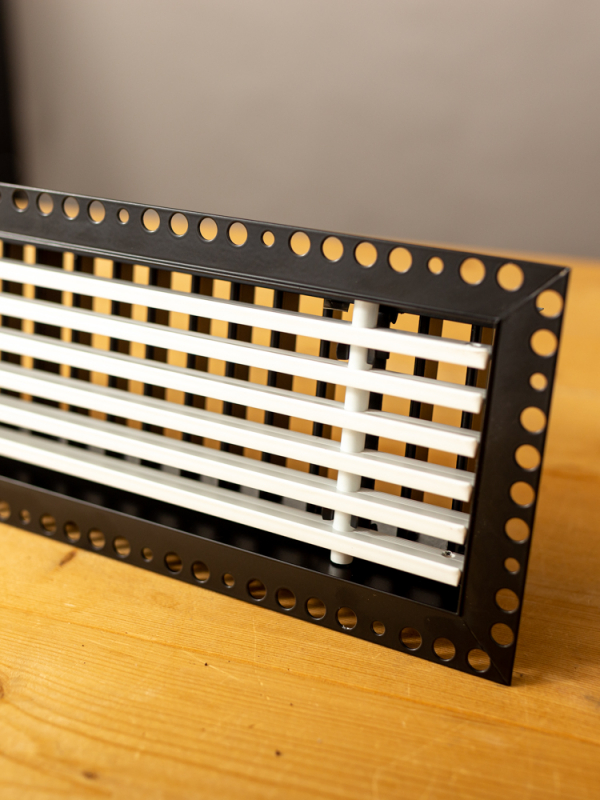 In stucbaar frameloos wandrooster 800x150mm met een vaste lamel aan de voorkant en instelbare aan de achterkant - Inclusief stuc-profiel